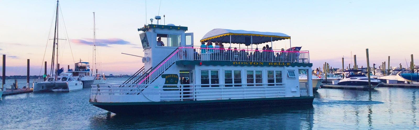 Boston Belle on Boston Harbor at sunset